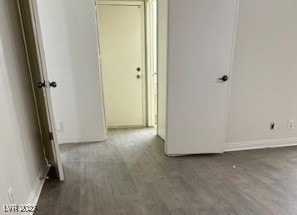 3214 Anacapa Way, Las Vegas, NV 89146 - hall featuring baseboards and wood finished floors