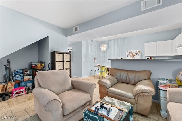 2060 Rancho Lake Dr Unit 103, Las Vegas, NV 89108 - living area featuring baseboards and a chandelier