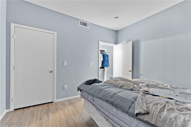 2060 Rancho Lake Dr Unit 103, Las Vegas, NV 89108 - bedroom featuring wood finished floors and baseboards