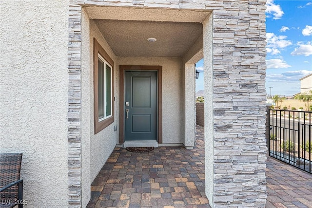 906 Cadence View Way, Henderson, NV 89011 - entrance to property featuring stucco siding and stone siding