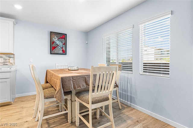 906 Cadence View Way, Henderson, NV 89011 - dining room with baseboards and light wood-style flooring