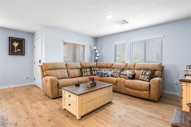 906 Cadence View Way, Henderson, NV 89011 - living area with light wood-type flooring and healthy amount of natural light
