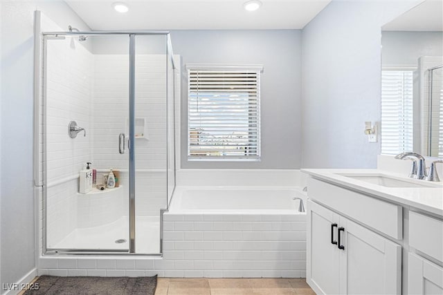 906 Cadence View Way, Henderson, NV 89011 - bathroom featuring vanity, a bath, a stall shower, recessed lighting, and tile patterned floors