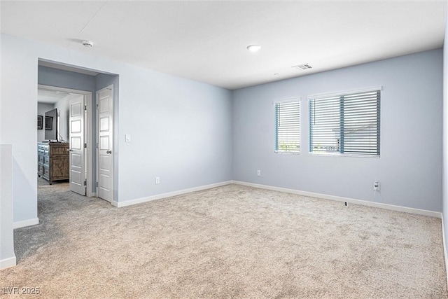 906 Cadence View Way, Henderson, NV 89011 - spare room featuring light carpet