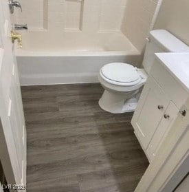 3254 Gold Run St, North Las Vegas, NV 89032 - full bathroom featuring vanity, wood finished floors, and shower / bath combination