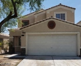 3254 Gold Run St, North Las Vegas, NV 89032 - mediterranean / spanish-style house with driveway and stucco siding