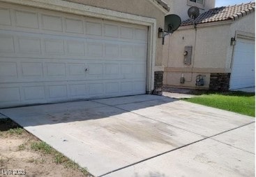 3254 Gold Run St, North Las Vegas, NV 89032 - garage with concrete driveway