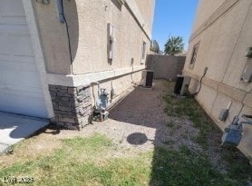 3254 Gold Run St, North Las Vegas, NV 89032 - view of side of home with a garage