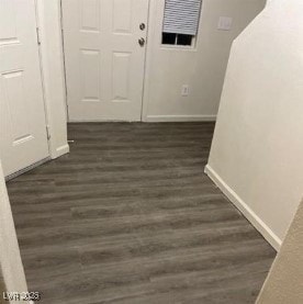 3254 Gold Run St, North Las Vegas, NV 89032 - corridor with baseboards and dark wood-style floors