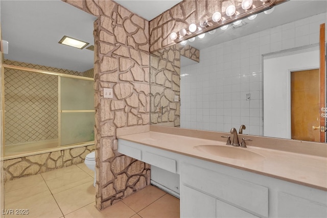 4709 Alpine Pl, Las Vegas, NV 89107 - bathroom with tile patterned flooring, tiled shower / bath, and vanity