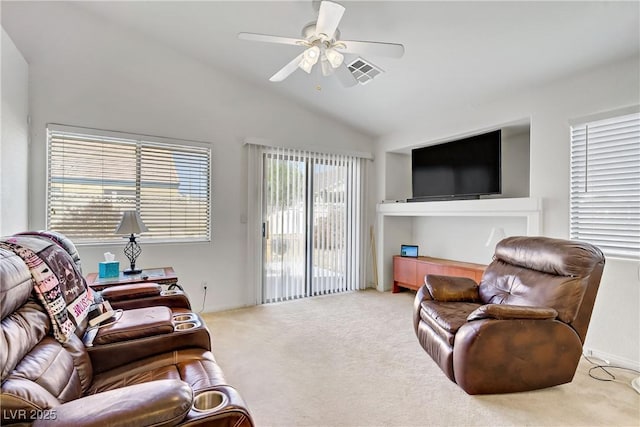 5630 Midnight Breeze St, North Las Vegas, NV 89081 - living area featuring lofted ceiling, carpet flooring, and a ceiling fan