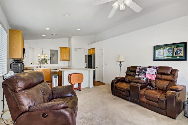 5630 Midnight Breeze St, North Las Vegas, NV 89081 - living room featuring vaulted ceiling, light colored carpet, a ceiling fan, and recessed lighting