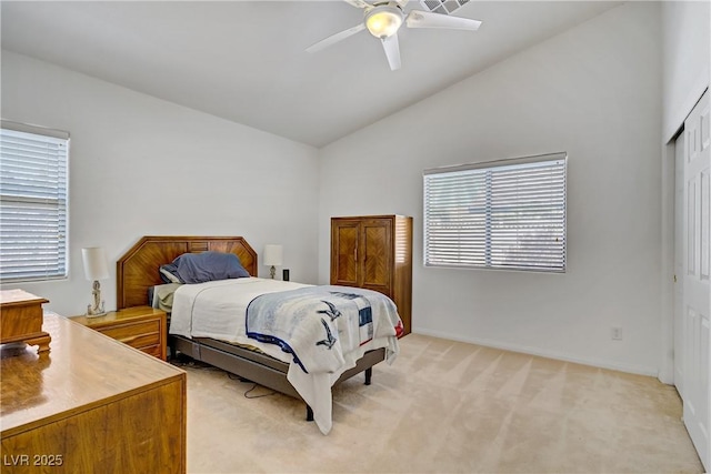 5630 Midnight Breeze St, North Las Vegas, NV 89081 - bedroom featuring lofted ceiling, multiple windows, a closet, light colored carpet, and ceiling fan