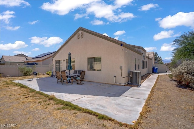 5630 Midnight Breeze St, North Las Vegas, NV 89081 - back of house featuring stucco siding, a fenced backyard, and a patio area