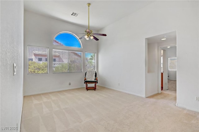 5630 Midnight Breeze St, North Las Vegas, NV 89081 - spare room featuring carpet flooring, ceiling fan, and a high ceiling