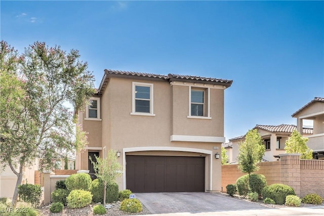8104 Switchback Run St, Las Vegas, NV 89166 - mediterranean / spanish-style house featuring an attached garage, stucco siding, driveway, and a tile roof