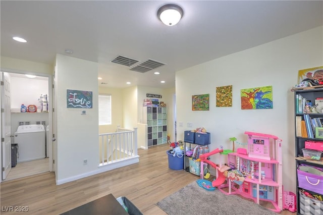 8104 Switchback Run St, Las Vegas, NV 89166 - rec room with wood finished floors, recessed lighting, and washer and dryer
