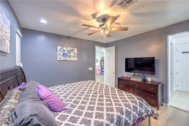 8104 Switchback Run St, Las Vegas, NV 89166 - bedroom with light wood finished floors, recessed lighting, and ceiling fan