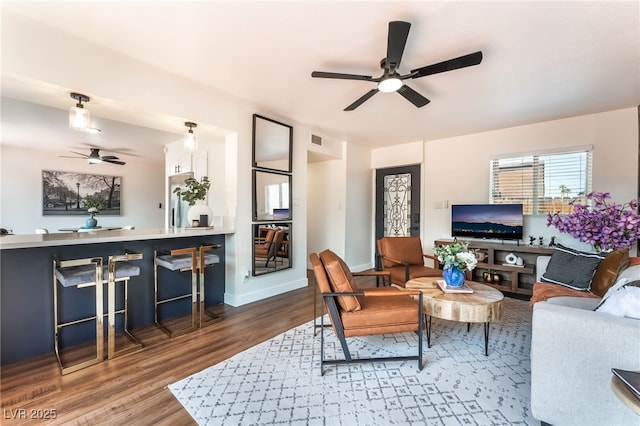 1467 Hialeah Dr Unit C, Las Vegas, NV 89119 - living room with a ceiling fan and wood finished floors