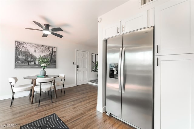 1467 Hialeah Dr Unit C, Las Vegas, NV 89119 - kitchen featuring stainless steel fridge with ice dispenser, white cabinets, ceiling fan, and wood finished floors