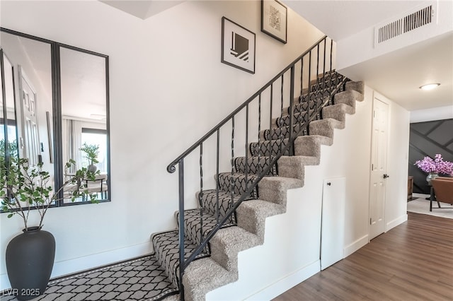 1467 Hialeah Dr Unit C, Las Vegas, NV 89119 - stairway with wood finished floors and baseboards