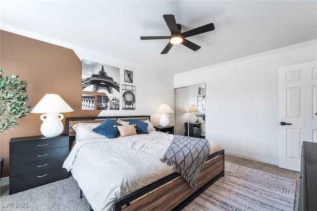 1467 Hialeah Dr Unit C, Las Vegas, NV 89119 - carpeted bedroom with crown molding, a closet, and ceiling fan