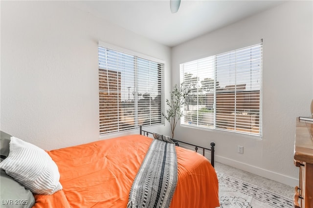 1467 Hialeah Dr Unit C, Las Vegas, NV 89119 - carpeted bedroom featuring baseboards and a ceiling fan