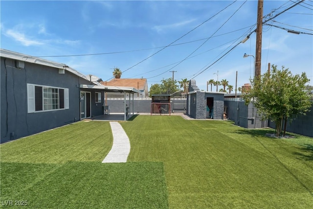 1905 Las Verdes St, Las Vegas, NV 89102 - fenced backyard with a storage unit and a patio