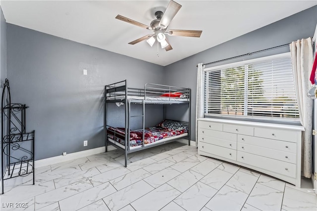1905 Las Verdes St, Las Vegas, NV 89102 - bedroom featuring light marble finish flooring and a ceiling fan