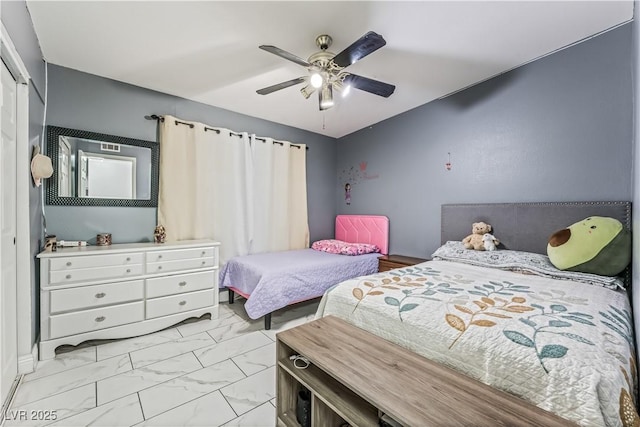 1905 Las Verdes St, Las Vegas, NV 89102 - bedroom featuring light marble finish flooring, a closet, and a ceiling fan