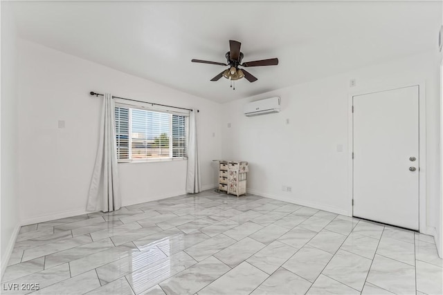 1905 Las Verdes St, Las Vegas, NV 89102 - empty room featuring a ceiling fan, a wall mounted air conditioner, and light marble finish flooring