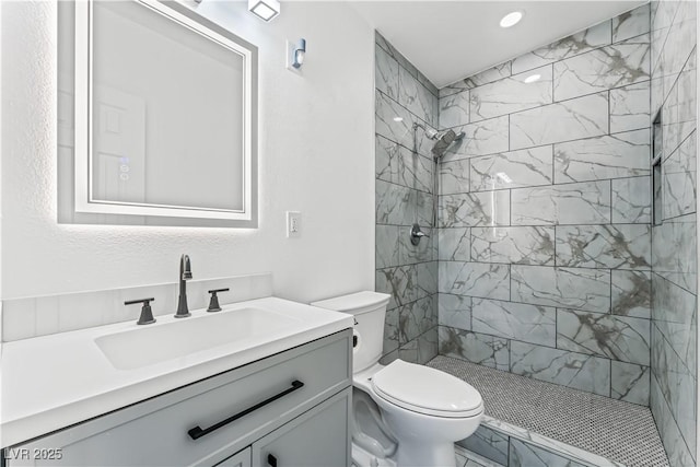 1905 Las Verdes St, Las Vegas, NV 89102 - bathroom with tiled shower, vanity, and recessed lighting