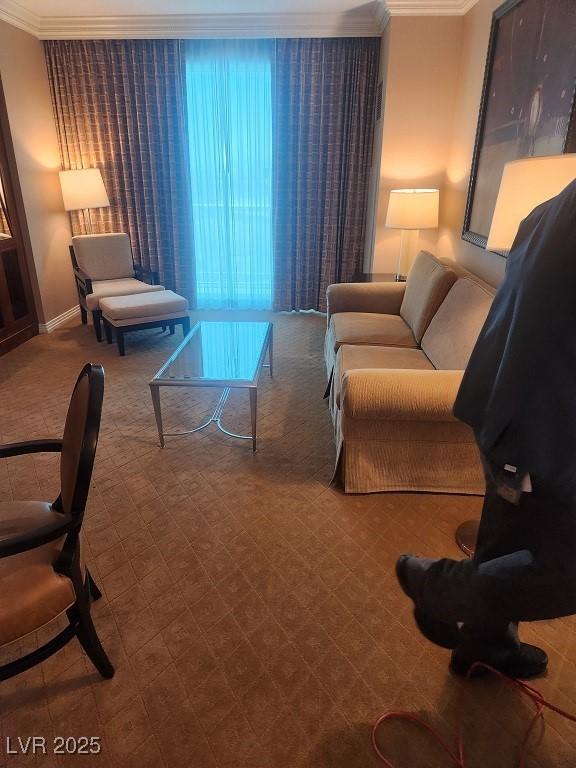 135 E Harmon Ave Unit 2621, Las Vegas, NV 89109 - living area with ornamental molding and carpet floors