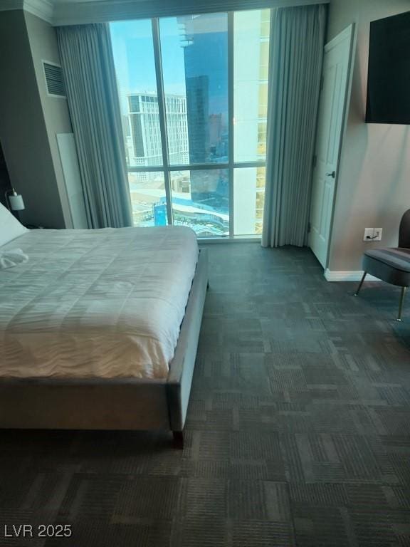 135 E Harmon Ave Unit 2621, Las Vegas, NV 89109 - bedroom featuring carpet flooring and baseboards