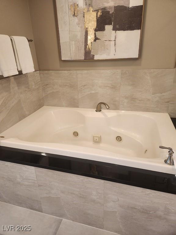 135 E Harmon Ave Unit 2621, Las Vegas, NV 89109 - bathroom featuring a tub with jets