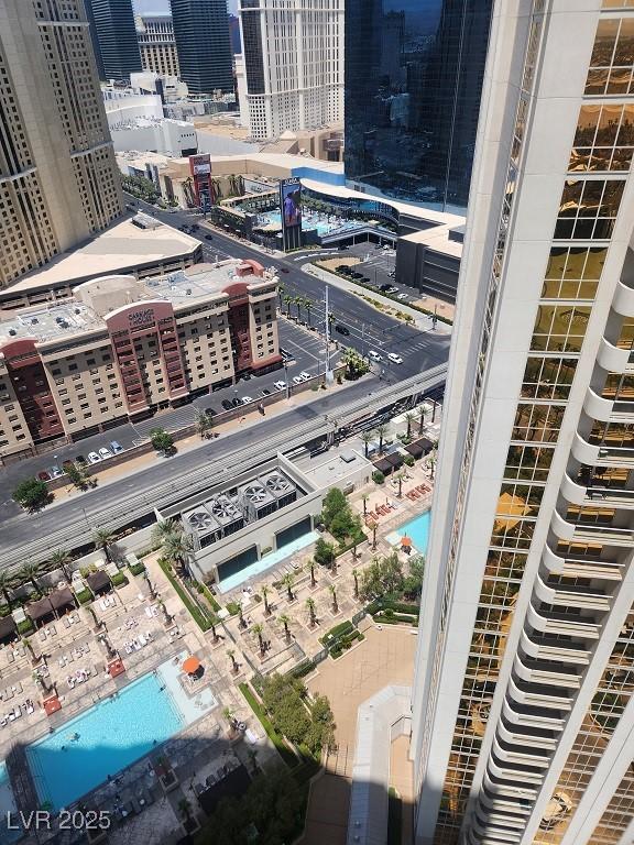 135 E Harmon Ave Unit 2621, Las Vegas, NV 89109 - view of urban area featuring a pool