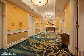 135 E Harmon Ave Unit 2621, Las Vegas, NV 89109 - hallway featuring elevator and carpet