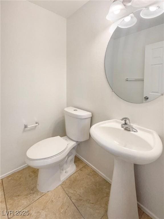 8872 Niche Ave, Las Vegas, NV 89149 - half bath featuring toilet and tile patterned flooring