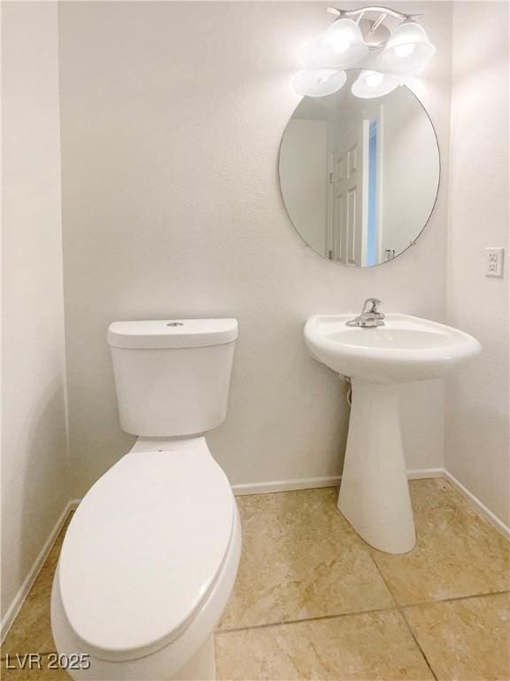 8872 Niche Ave, Las Vegas, NV 89149 - bathroom featuring toilet and tile patterned flooring
