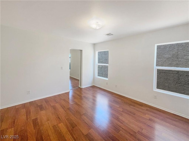 8872 Niche Ave, Las Vegas, NV 89149 - spare room with wood finished floors and baseboards