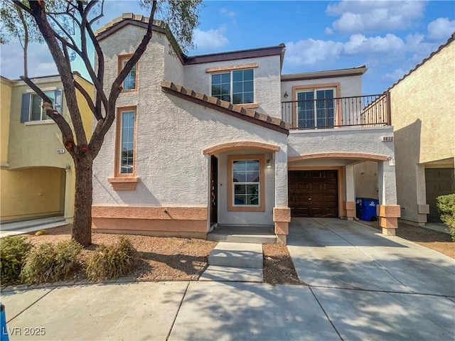 8872 Niche Ave, Las Vegas, NV 89149 - mediterranean / spanish-style house featuring a balcony, driveway, stucco siding, an attached garage, and a tile roof