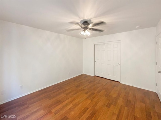 8872 Niche Ave, Las Vegas, NV 89149 - unfurnished bedroom featuring wood finished floors, a closet, and ceiling fan