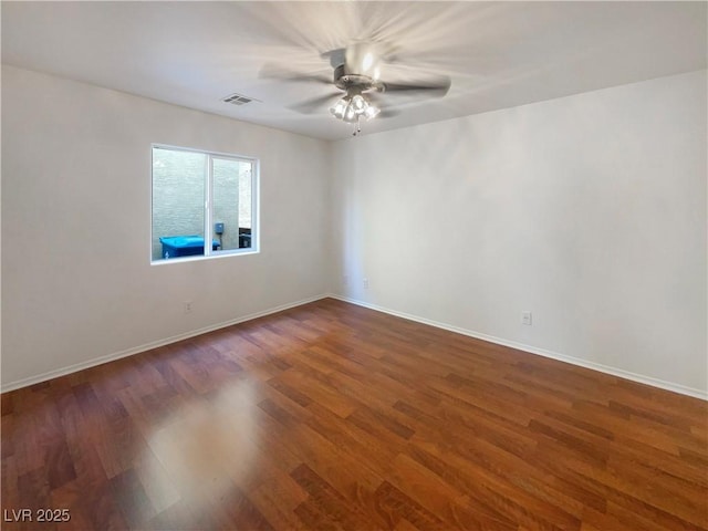 8872 Niche Ave, Las Vegas, NV 89149 - spare room with ceiling fan and dark wood finished floors