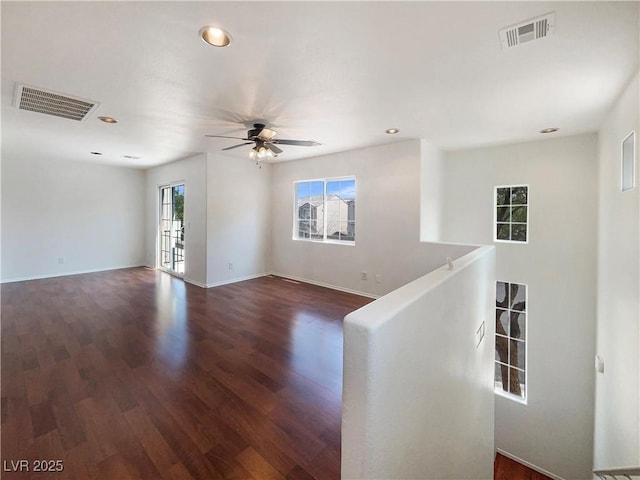 8872 Niche Ave, Las Vegas, NV 89149 - spare room featuring dark wood-type flooring, ceiling fan, and recessed lighting