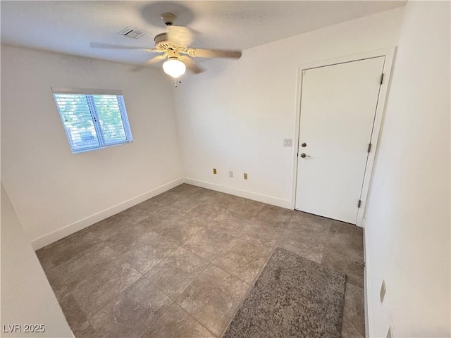 2406 Showcase Dr, Las Vegas, NV 89134 - empty room with a ceiling fan and baseboards