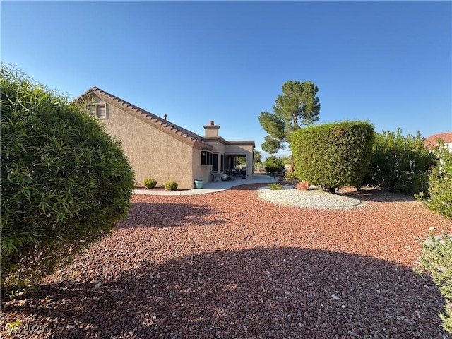 2406 Showcase Dr, Las Vegas, NV 89134 - view of yard with a patio area