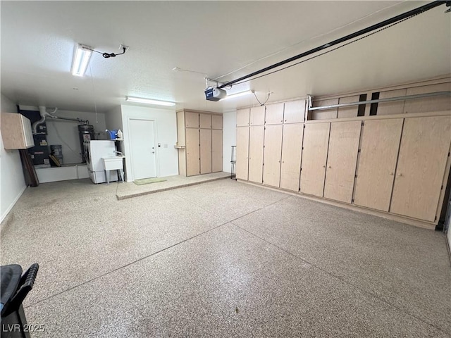 2406 Showcase Dr, Las Vegas, NV 89134 - garage with water heater and a garage door opener