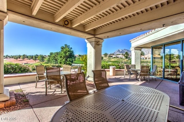 2406 Showcase Dr, Las Vegas, NV 89134 - view of patio / terrace with outdoor dining space and a mountain view