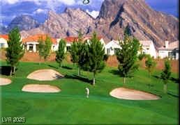 2406 Showcase Dr, Las Vegas, NV 89134 - surrounding community featuring a mountain view, view of golf course, and a yard