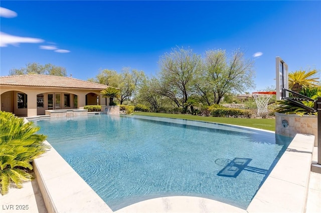 9801 Orient Express Ct, Las Vegas, NV 89145 - view of swimming pool featuring a pool with connected hot tub
